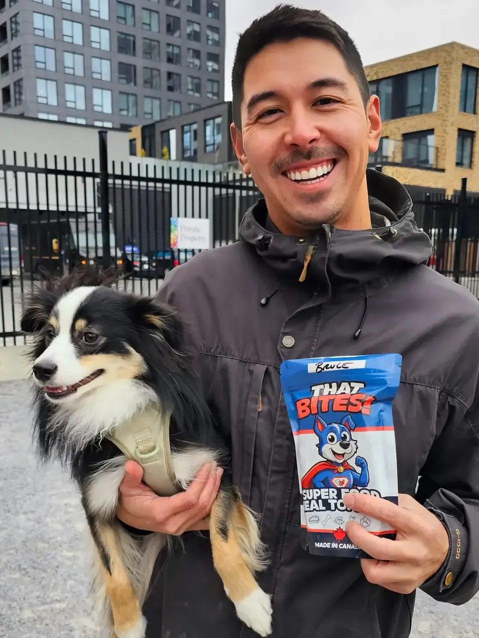 happy dog owner with dog after buying that bites natural superfood dog food topper, delivered fresh in Calgary, AB