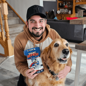 happy dog with Alex smiling for that bites natural superfood dog food topper, delivered fresh in Calgary, AB
