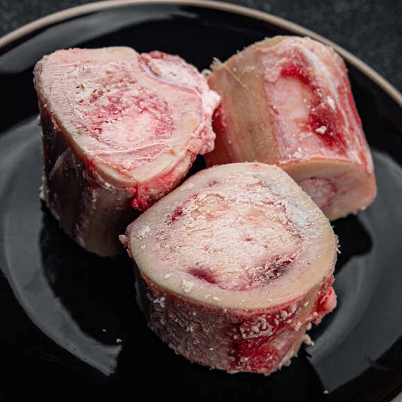 piece of raw beef bone marrow for the That Bites! Superfood dog meal toppers made fresh in Calgary, AB